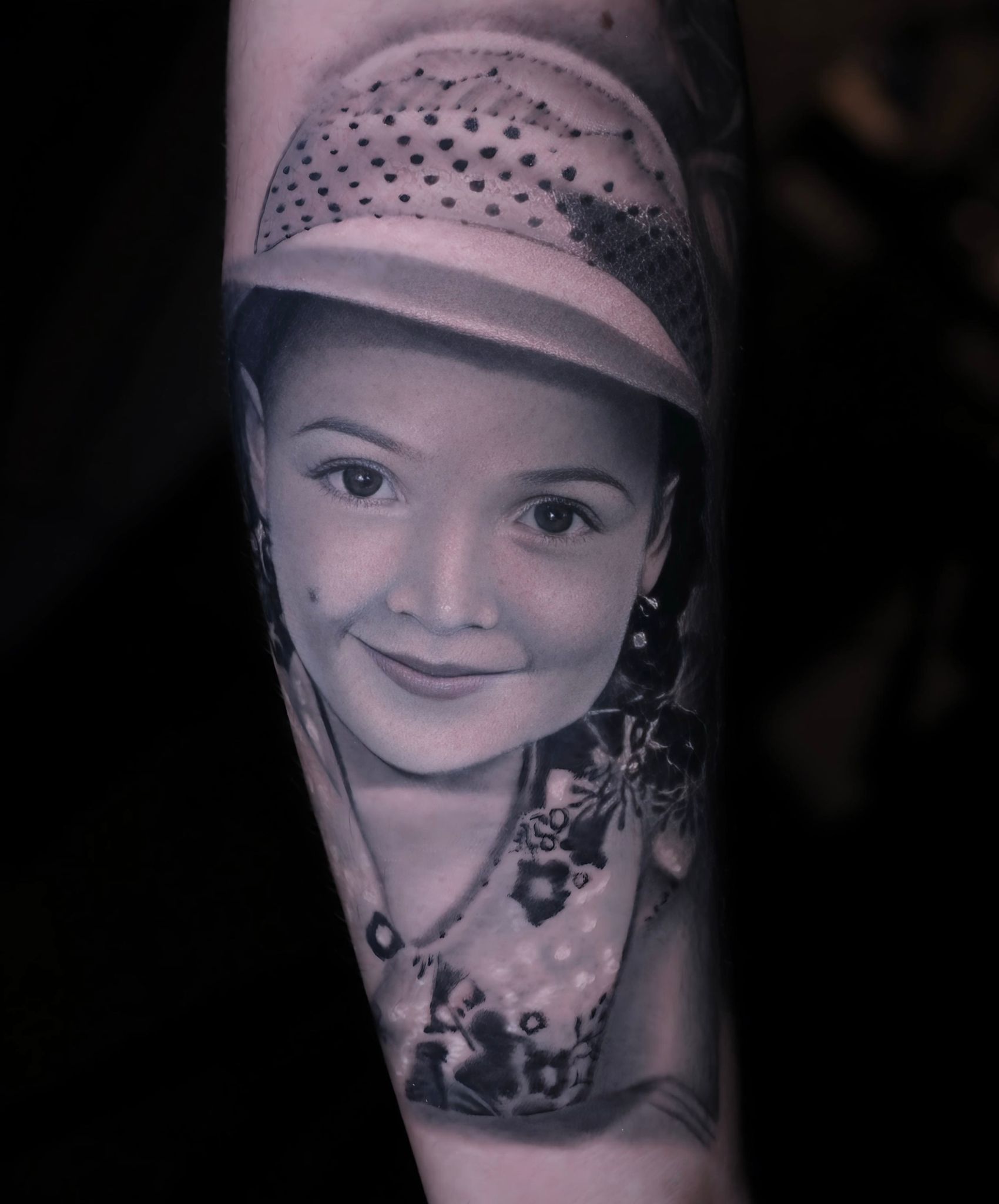 Realism portrait tattoo on an arm by Jonathan Cataño